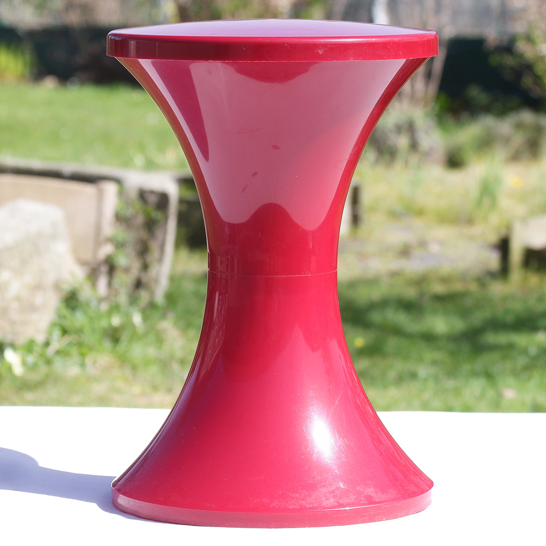 Vintage burgundy Tam Tam Stamp stool by Massonnet from the 1970s