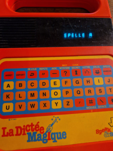 Jeu électronique vintage La Dictée Magique ( 1981 ) / avec le cache pile