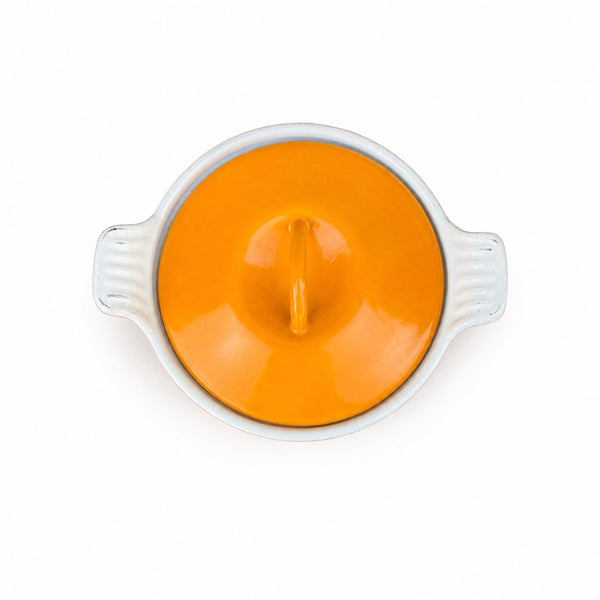 Mini cocotte ancienne en fonte émaillée orange et blanche – diamètre 14 cm