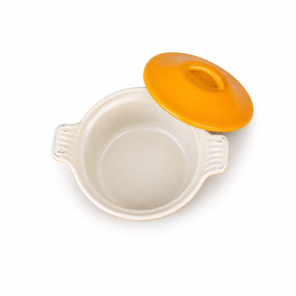 Mini cocotte ancienne en fonte émaillée orange et blanche – diamètre 14 cm