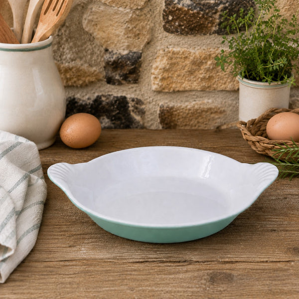 Plat à œufs ancien Le Creuset n°3 en fonte émaillée turquoise