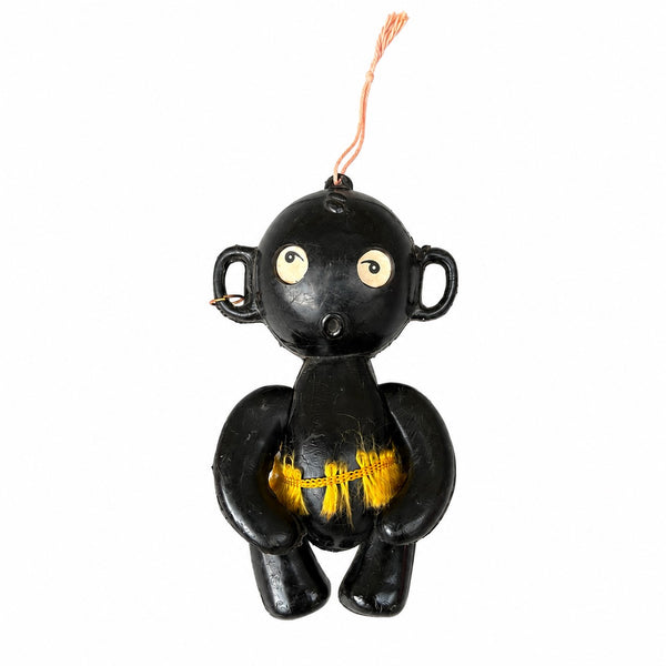 Ancien personnage publicitaire Mi-Cho-Ko La Pie qui Chante en plastique noir avec jupe en fibres jaunes – Années 1960-1970