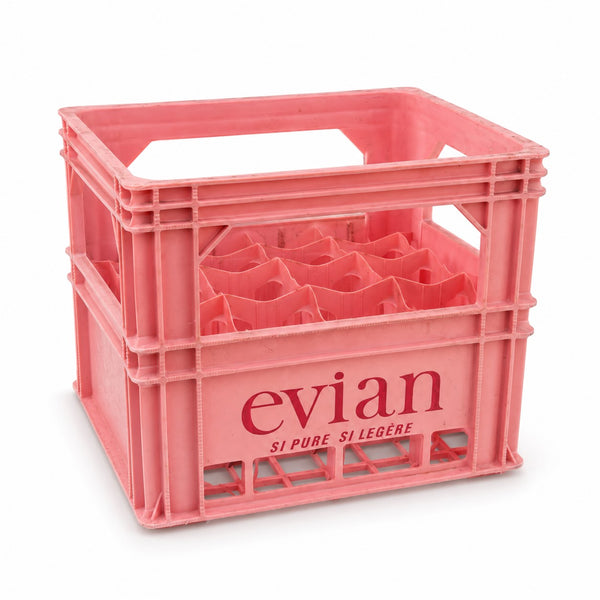 Casier à bouteilles publicitaire Evian en plastique rose 12 litres de 1969