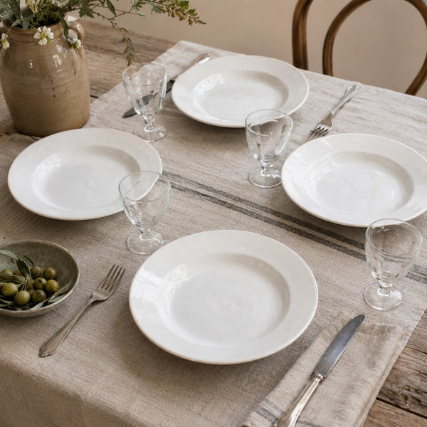 Lot de 4 assiettes creuses anciennes en faïence blanche Moulin des Loups