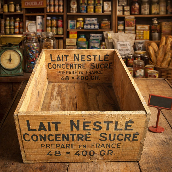 Caisse en bois ancienne Nestlé – Lait concentré sucré (fin XIXe – début XXe siècle)