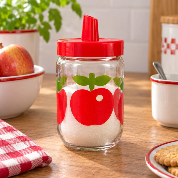 Pot à sucre ancien Henkel en verre décor pommes rouges avec couvercle rouge