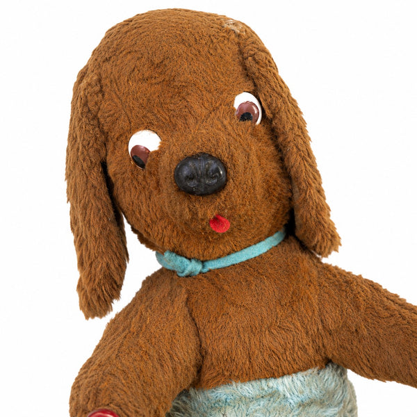 Jouet ancien à tirer animé – chien en peluche sur tricycle à skis