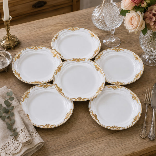 Lot de 6 assiettes plates en porcelaine de Limoges Bernardaud modèle « Coquille » à décor doré