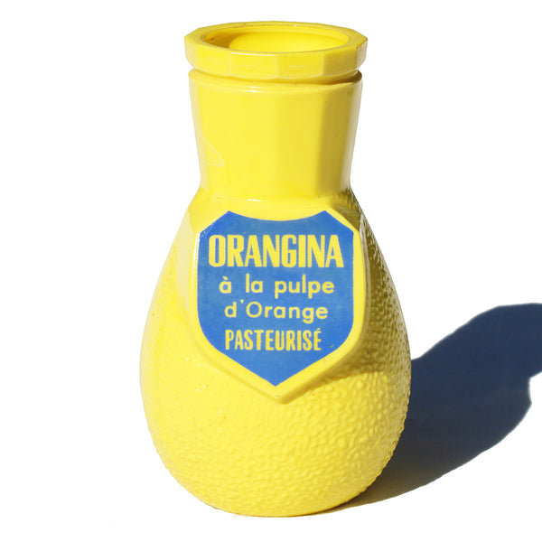 Porte paille publicitaire de bistrot vintage Orangina en opalex jaune