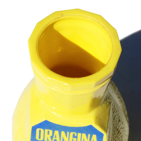 Porte paille publicitaire de bistrot vintage Orangina en opalex jaune