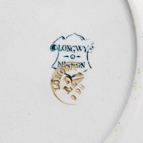 Ancienne assiette plate 23.7 cm en faïence de Longwy modèle Mignon