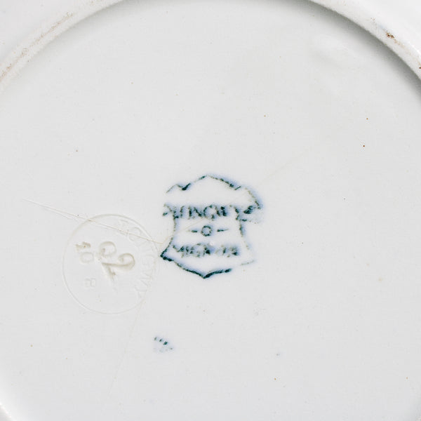 Ancienne assiette creuse 23.3 cm en faïence de Longwy modèle Mignon