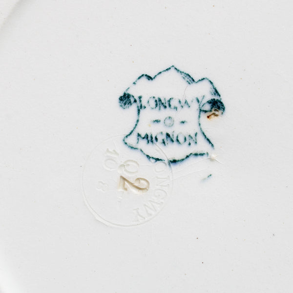 Ancienne assiette creuse 23.4 cm en faïence de Longwy modèle Mignon