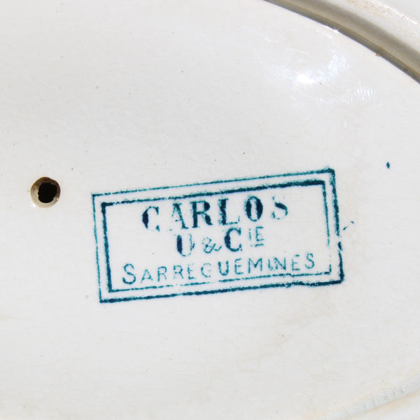 Ancienne saucière en faïence de U & C Sarreguemines modèle Carlos