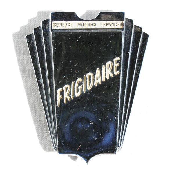 Plaque / insigne publicitaire vintage Frigidaire / General Motors France / métal chromé