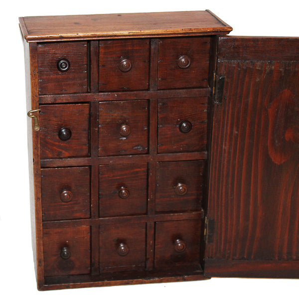 Ancienne petite armoire d'apothicaire / pharmacie / 12 tiroirs / layette