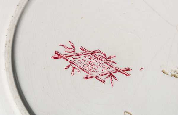 Ancien plat rond 30 cm en faïence de Longchamp modèle Exotique
