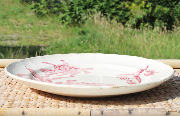 Ancien plat rond 30 cm en faïence de Longchamp modèle Exotique