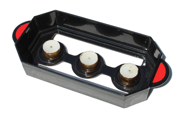 Chauffe plat vintage Staub en fonte émaillée noire à bougies / poignées rouges