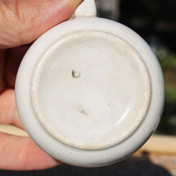 Ancienne tasse à café en faïence / modèle à fleurs art déco