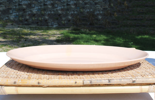 Ancien plat ovale 38 cm en faïence de Digoin Sarreguemines coloris rose poudré