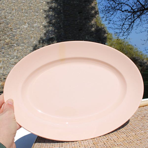 Ancien plat ovale 38 cm en faïence de Digoin Sarreguemines coloris rose poudré