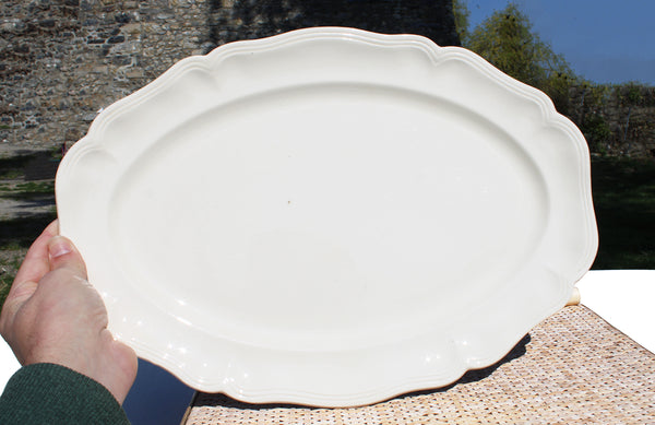 Ancien plat ovale 44 cm en faïence de Sarreguemines coloris ivoire
