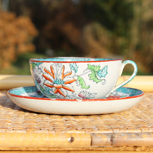 Paire de tasses à thé anciennes + soucoupes modèle fleuri japonisant