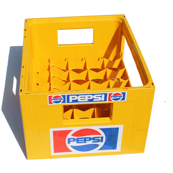 Caisse casier / distributeur à bouteilles vintage Pepsi Cola en plastique jaune