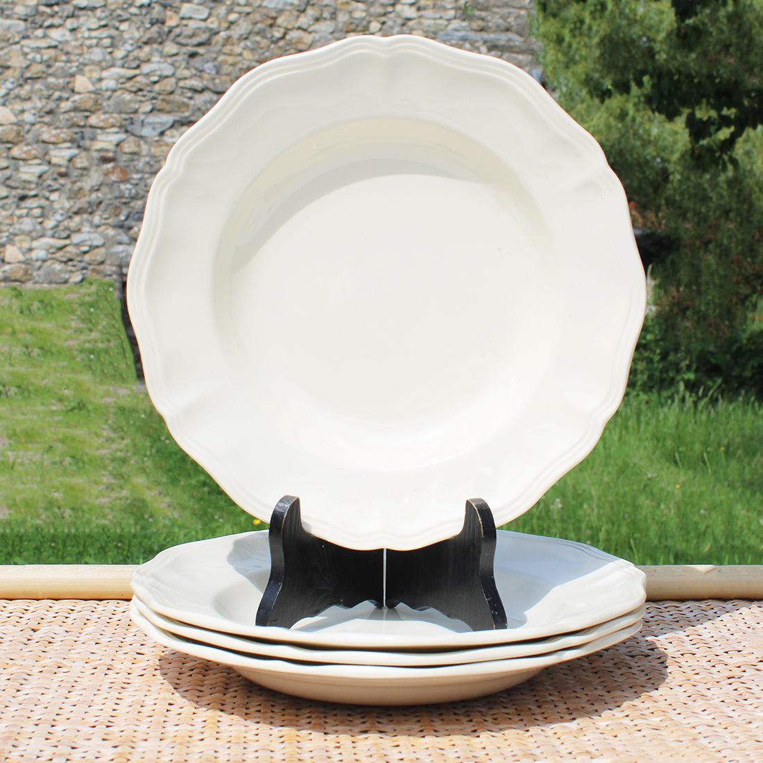 Ensemble de 4 assiettes creuses en faïence de Sarreguemines coloris ivoire