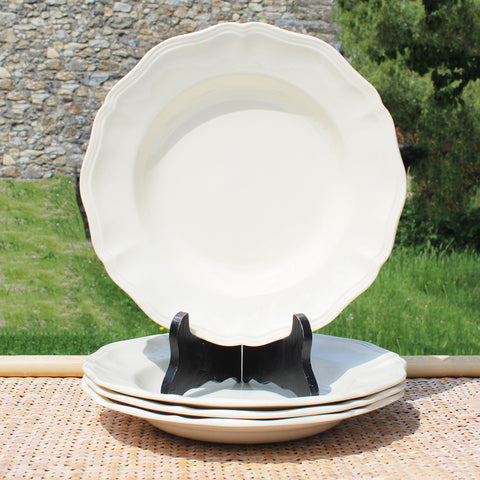 Ensemble de 4 assiettes creuses en faïence de Sarreguemines coloris ivoire