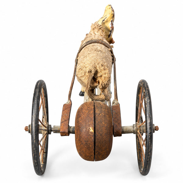 Petit jouet ancien à tirer du XIXe siècle – chèvre attelée à un chariot métallique avec sonnette, 19 cm