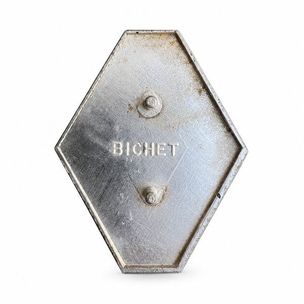 Emblème et logo automobile vintage Renault en métal noir et argenté – 61 x 49 mm