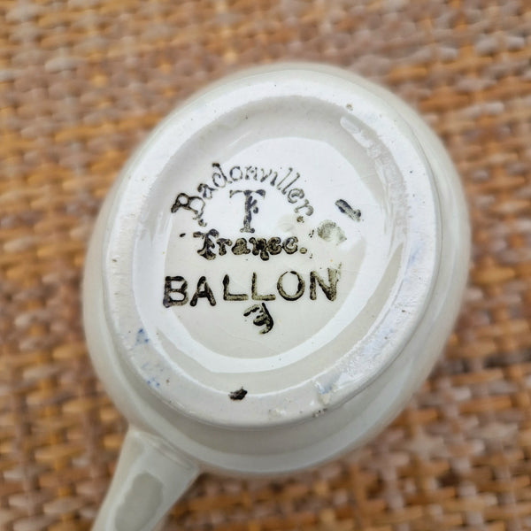 Ancienne saucière en faïence de Badonviller modèle Ballon