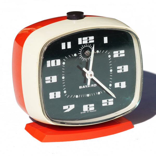 Réveil mécanique vintage Bayard en plastique orange & crème