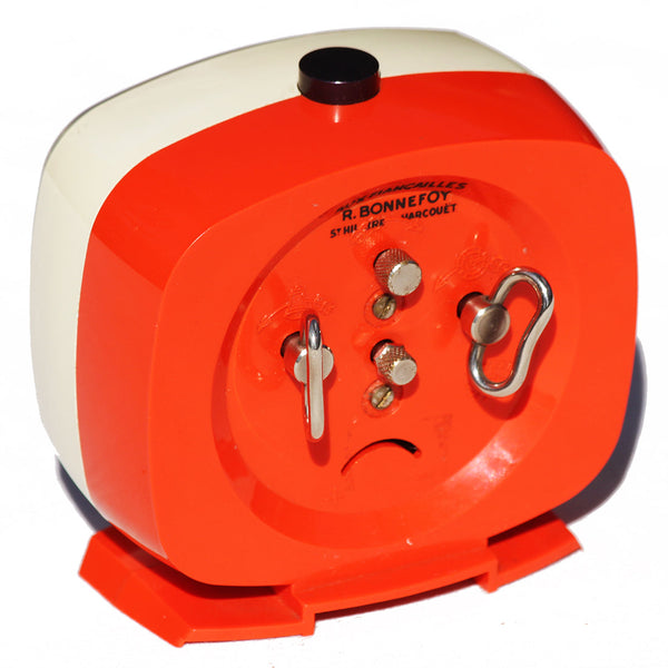 Réveil mécanique vintage Bayard en plastique orange & crème