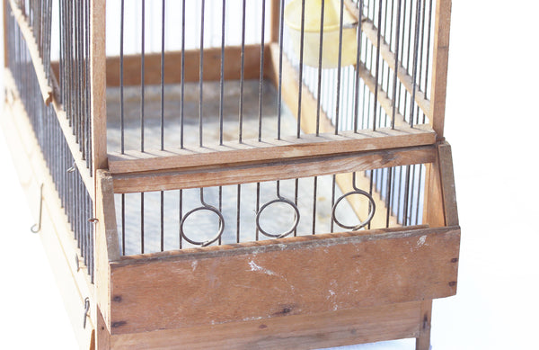 Old wooden bird cage from the mid-20th century