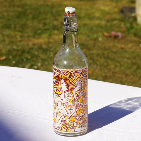 Ancienne bouteille de jus de fruits de bistrot modèle femme Art déco