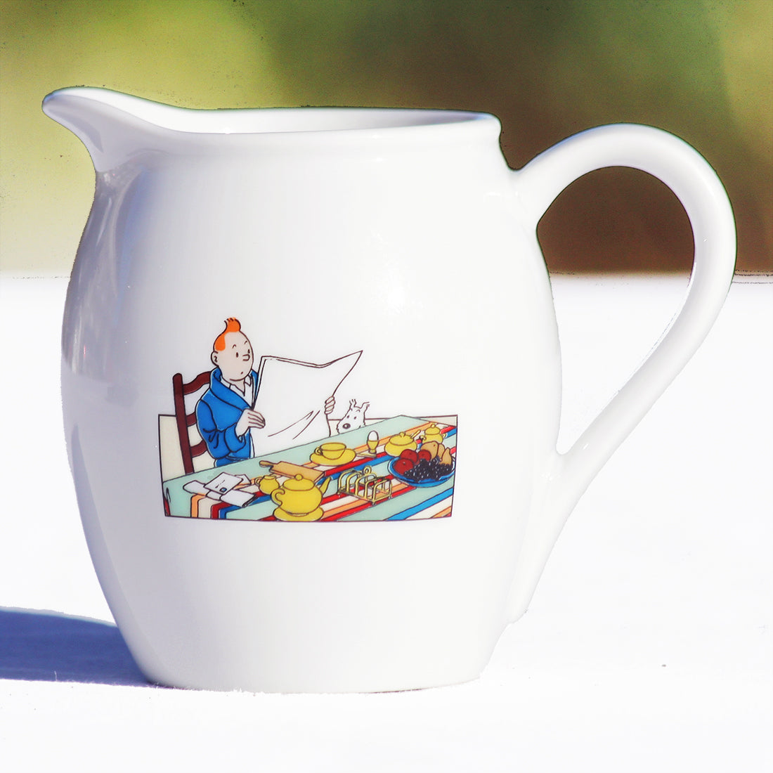 Petit pot à lait en porcelaine Tintin Les 7 Boules de Cristal ( Hergé/Moulinsart 1998 )