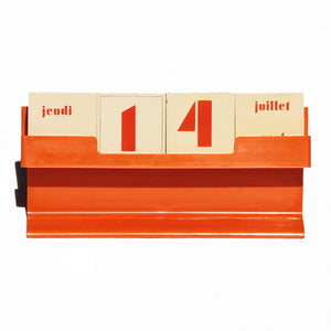Calendrier perpétuel / dateur vintage en plastique orange