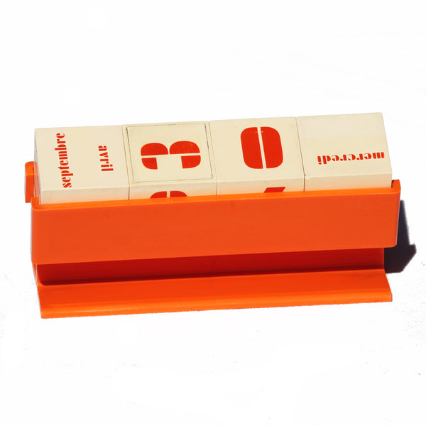 Calendrier perpétuel / dateur vintage en plastique orange