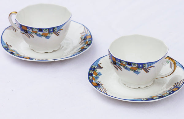 Duo de tasse à café en porcelaine de Limoges Balleroy & Cie modèle Art déco