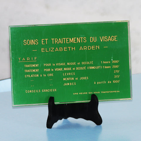 Plaque vintage de cabinet d'esthéticienne pour des soins utilisant les produits Elizabeth Arden