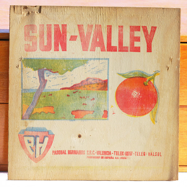 Ancien panneau en bois publicitaire pour les oranges Sun-Valley