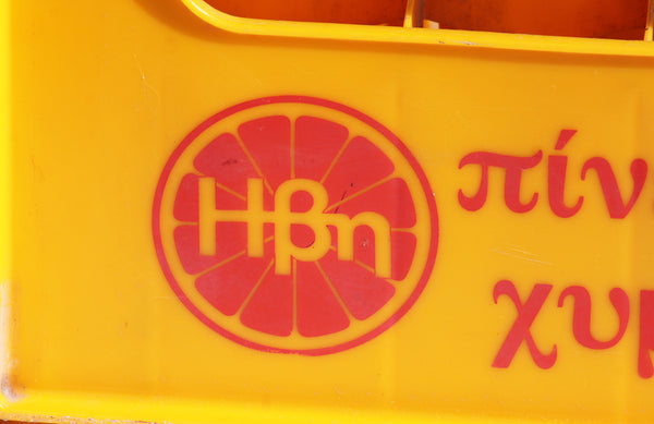 Caisse casier à bouteilles publicitaire vintage jus de fruits grecs HBN en plastique