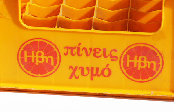 Caisse casier à bouteilles publicitaire vintage jus de fruits grecs HBN en plastique