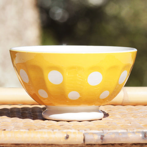 Old faceted earthenware bowl from Digoin Sarreguemines yellow with white polka dots