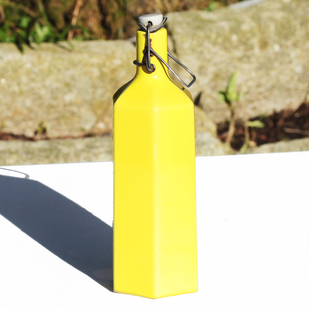 Ancienne bouteille de limonade en grès vernissé jaune pop cigogne – La Roue  du Passé