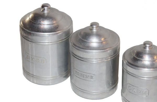 Série de 6 pots à épices emboîtables anciens en aluminium