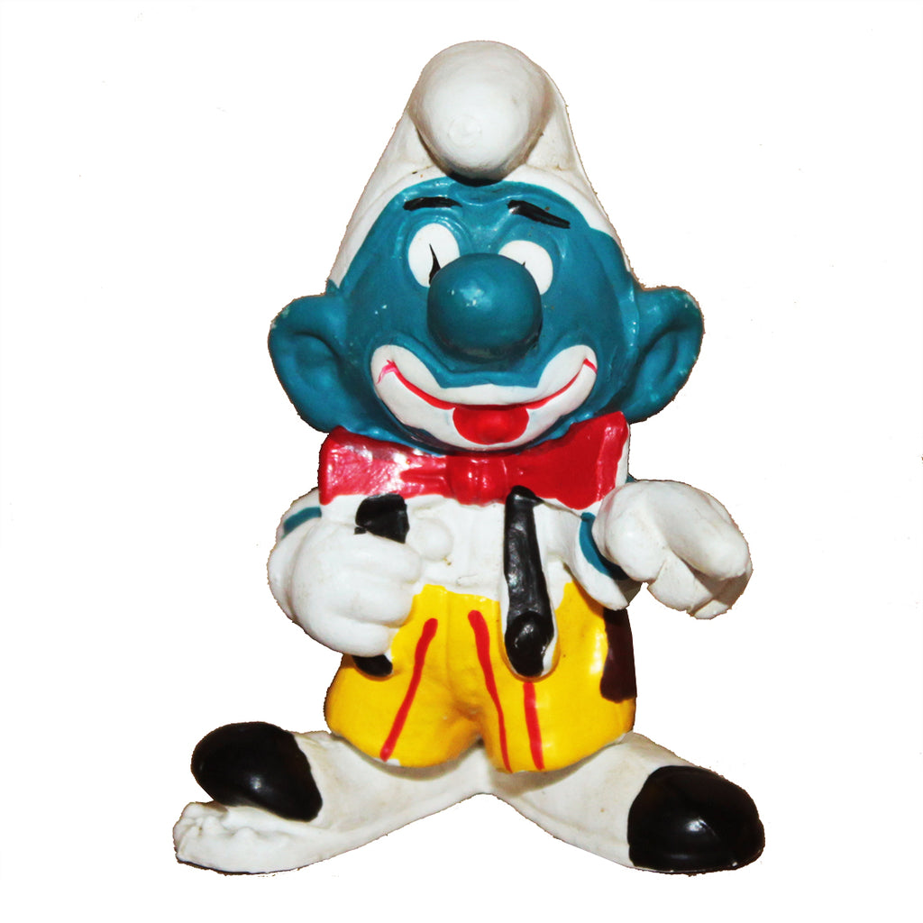 PEYO FIGURINE SCHTROUMPF APPUYER SUR SA PELLE JAUNE ET ROUGE ( V PEYO FIGURINE SCHTROUMPF APPUYER SUR SA PELLE JAUNE ET ROUGE ( V